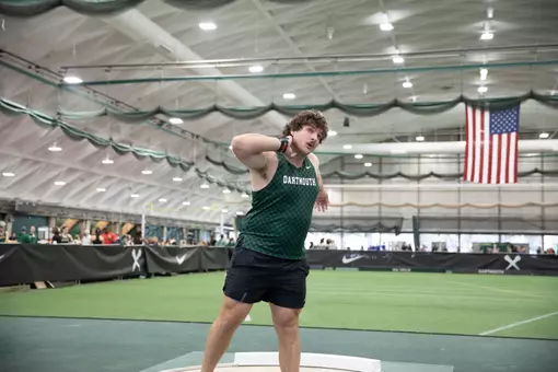 Colton McMaster throws the shot put