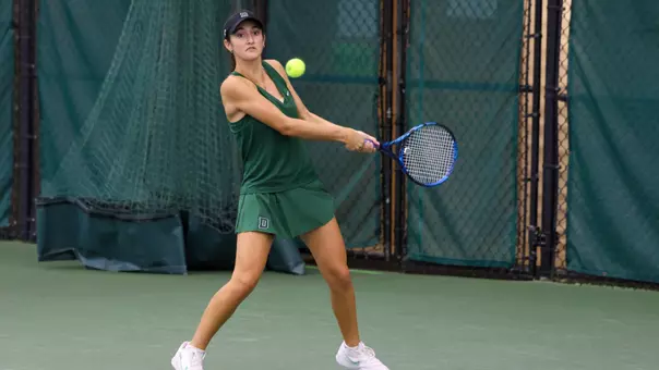 Sam Grosjean hits the ball