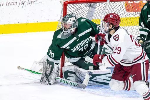 Croteau hugs post at Harvard