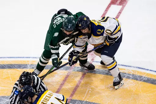 Cam MacDonald battles with a QPac player
