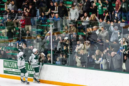 Andrew Clarke cellys in front of fans at Thompson