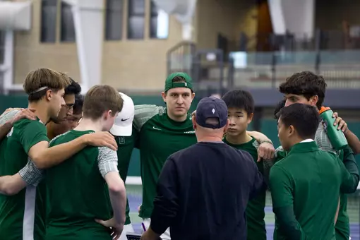 Men's tennis huddle at home