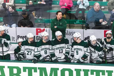 Reid Cashman behind the bench at Thompson Arena