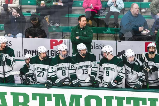 Reid Cashman behind the bench at Thompson Arena