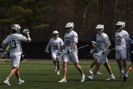 DMLAX celebrates goal vs Yale
