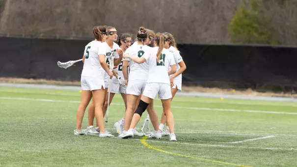 DWLAX celebrates a goal