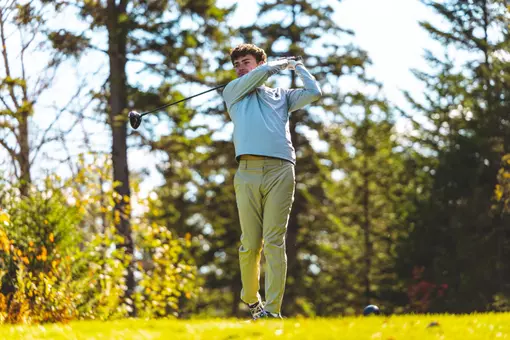 Fin Szafnauer swings