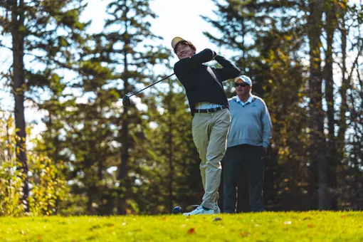 Aaron Zhang tees off