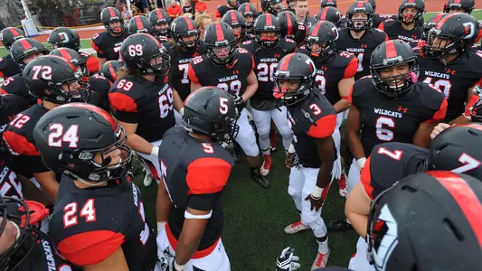 Photo of football huddle
