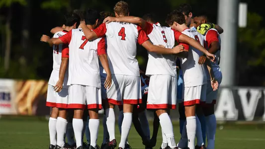 Men's Soccer Team Huddle Photo