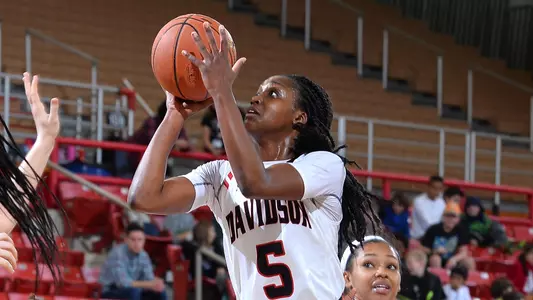 Justine Lyon Davidson women's basketball action photo