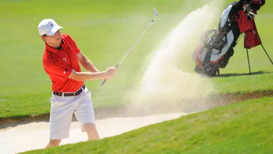 Photo of Jack Lang hitting from bunker