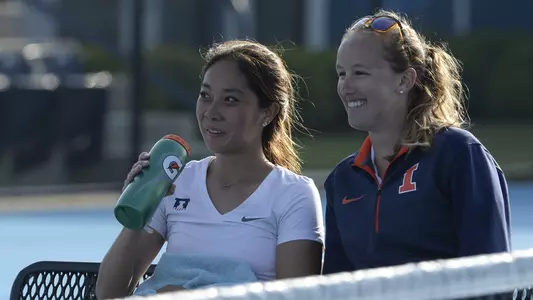 Kelly Cameron w. tennis assistant coach action shot