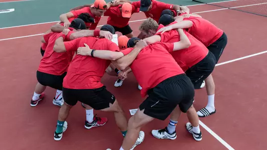 men's tennis team action