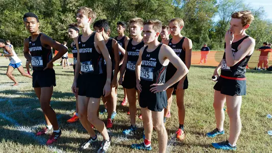 A photo of men's cross country on the start line