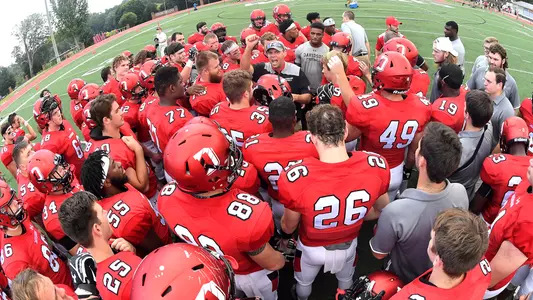 A photo of the football team celebrating a victory