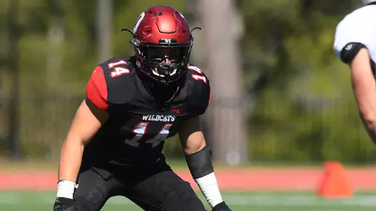 A photo of George Hatlowich lined up against Morehead State