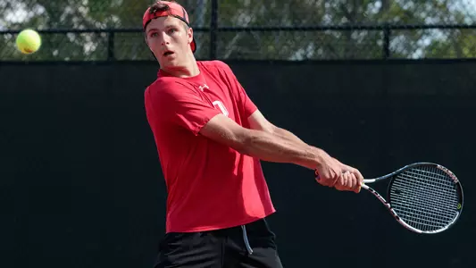 Artem Khrapko men's tennis action photo
