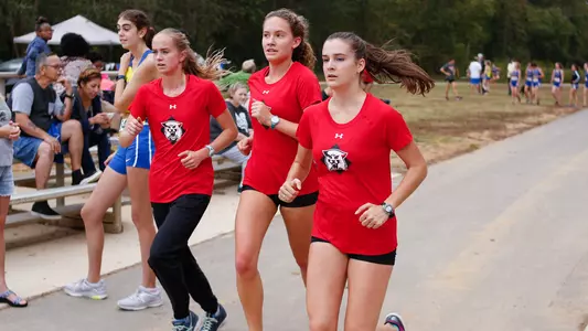 A photo women's xc team warming up