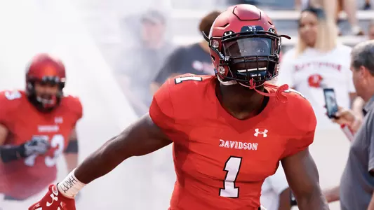 A photo of Tony Collins coming our of the locker room