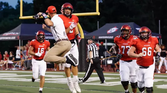 Photo of Wesley Dugger celebrating a touchdown
