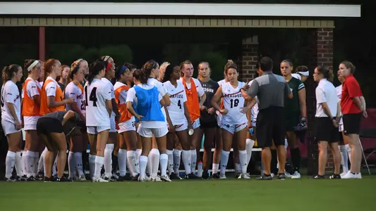women's soccer team huddle