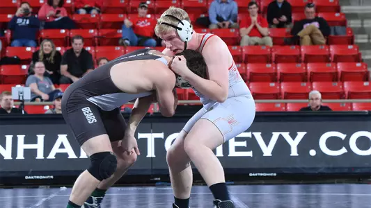 A photo of Mitchell Trigg against Brown