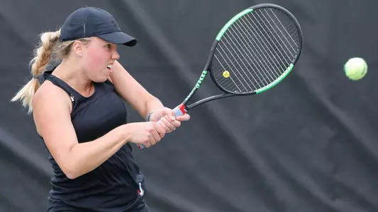 megan scholvick women's tennis action shot