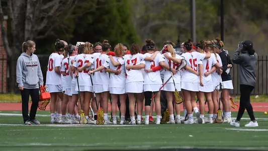 Women's lax huddle