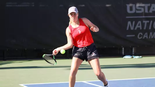 megan scholvick women's tennis action shot