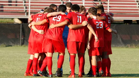 Men's Soccer Huddle Image