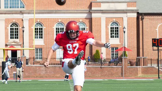 A photo of Evan Pritchard warming up against San Diego