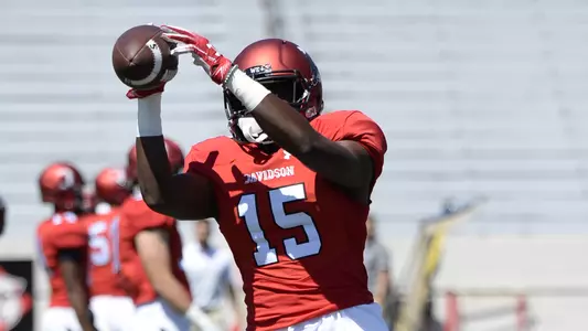A photo of Bernard Turner, Jr. warming up against San Diego