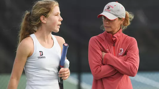 mira gladstone with head coach
