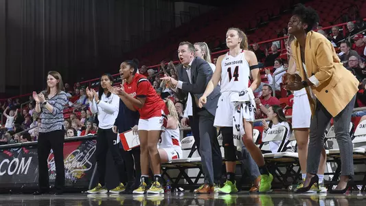 women's basketball bench cheering