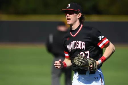 Parker Nolan running in the field