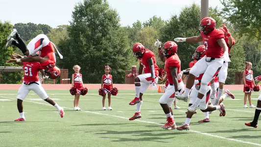 A photo of the football team running out in 2019