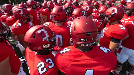 The football team in huddle