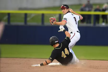 Gravely throw on double play