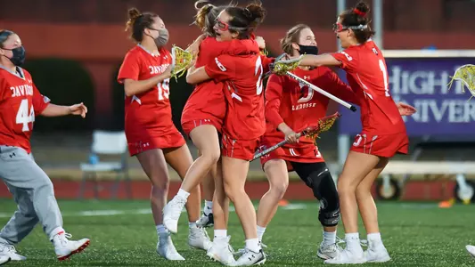 Wildcats hugging after a win