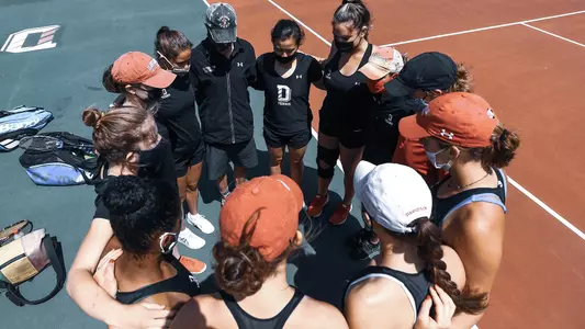 Women's team huddle
