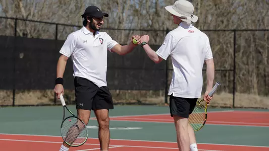 Kavaran and Clark fist bump