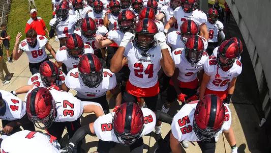 A photo of the football team at the NCAA Playoffs