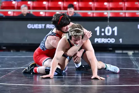 Bryce Sanderlin wrestles Vladimir Sukhikh of Queens