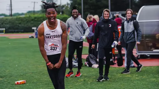 Jordan Benson celebrates at the A10 Outdoor Championships