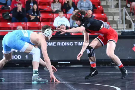 Tanner Peake wrestles against The Citadel on Feb. 3, 2023