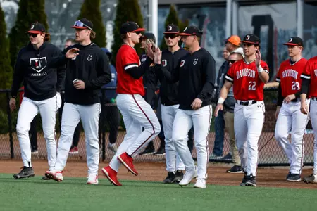 baseball high fives vs NJIT 2023