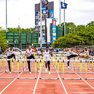 Jayden Smith, Bryce Anthony, and Jordan Benson compete in the 110 hurdles at 2022 A-10 Outdoor Championships
