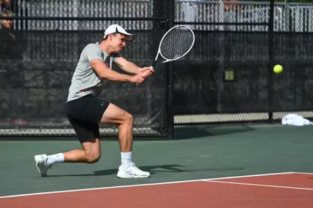 Davidson takes on Dayton in A10 men’s tennis action at the Davidson Tennis Courts on Friday, April 08, 2022 in Davidson, North Carolina.