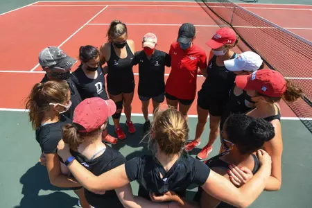 Women's Tennis team huddle vs. App State
